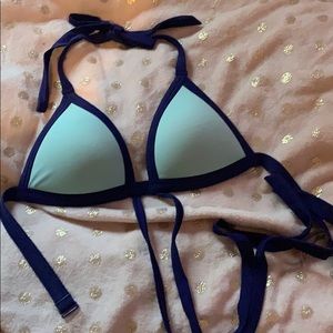 Victoria’s Secret bikini top worn lightly
